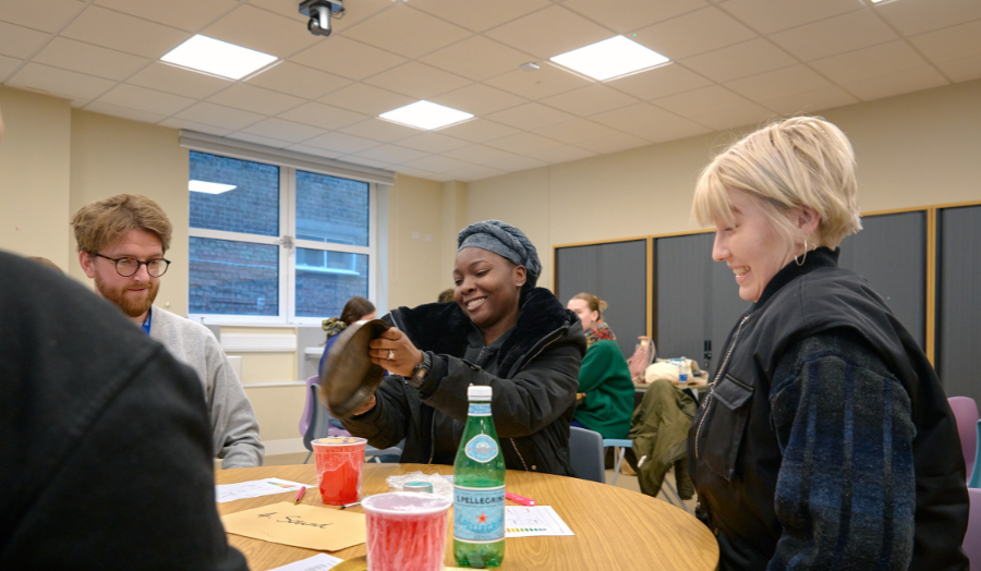 students talking in a classroom