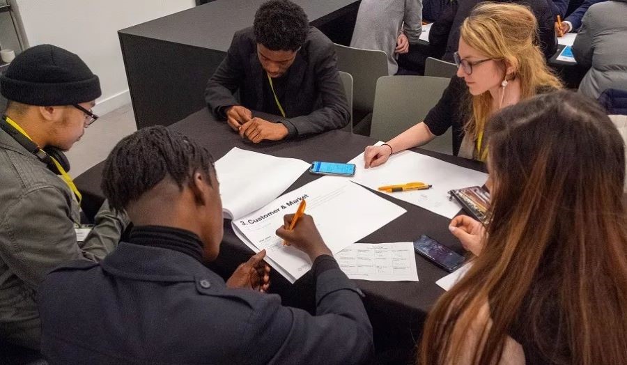students working on the table